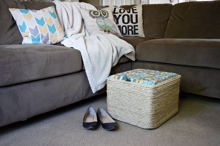 DIY storage ottoman from milk crate using rope