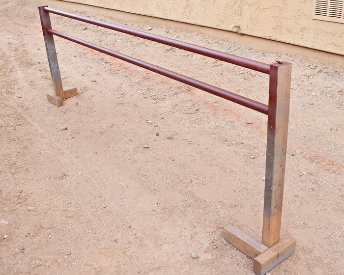 DIY spraypainting stands for a DIY curtain rod
