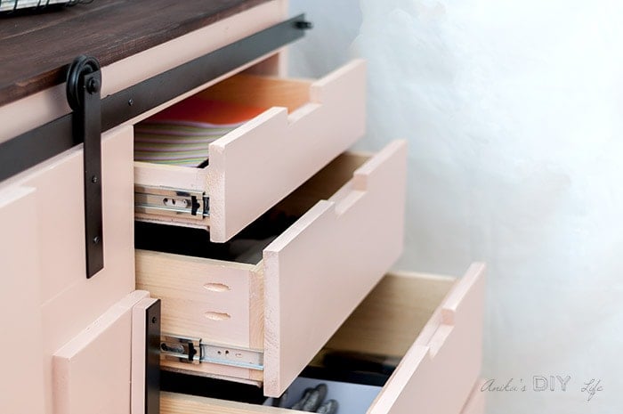 Close up pf open drawers in the DIY sliding barn door cabinet with drawers