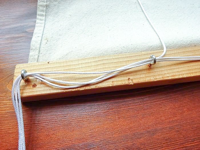 Adding the DIY roman shade pull cord.