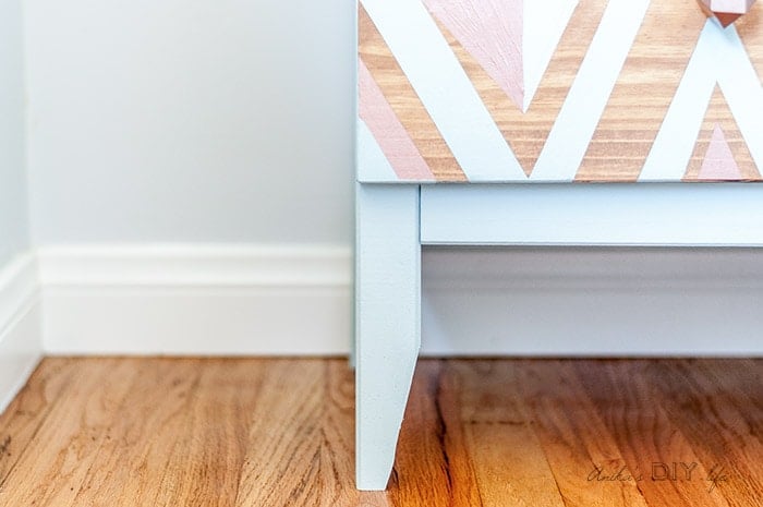 close up of feet of the Ikea Tarva nightstand makeover