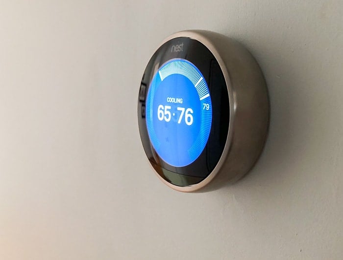 Smart thermostat on wall.
