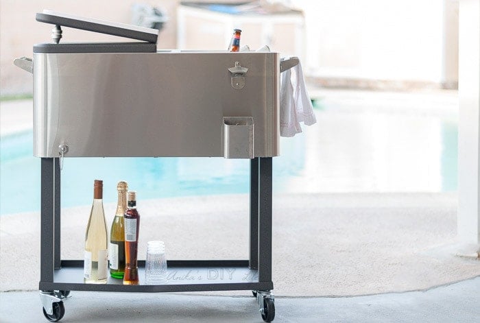 Stainless steel cooler filled with ice and drinks