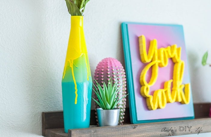 Close up of metal vase with drip effect using spray paint