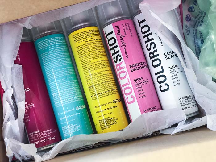 collection of colorful spray paint cans