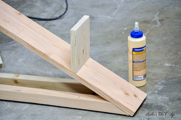 attaching shelves to the DIY plant stand