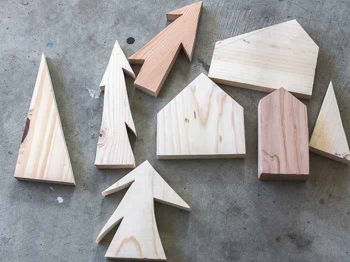 DIY Christmas Village cut outs on the floor