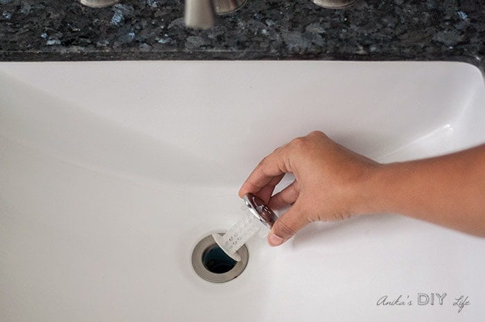 Installing SinkShroom in the sink