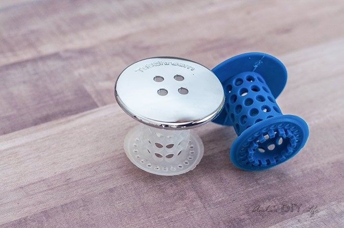 TubShroom in chrome and blue silicone.