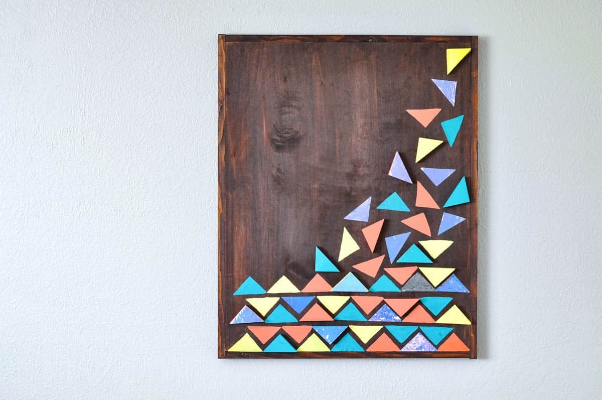 Scrap wood wall art painted in bright colors