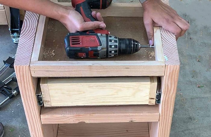 attaching secret compartment to the DIY nightstand with drawer
