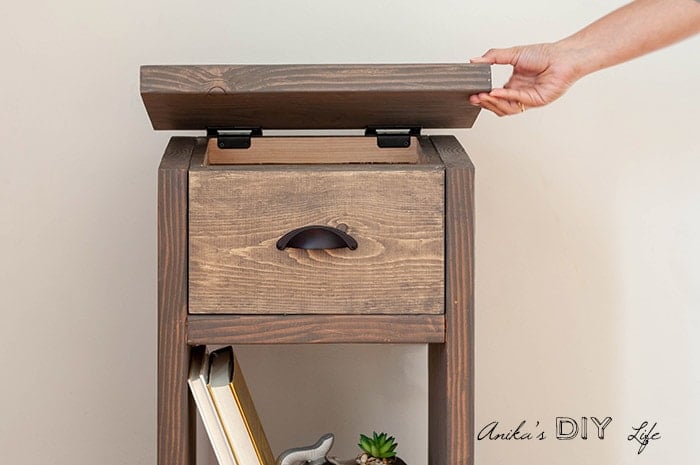 Hidden compartment by opening top in DIY nightstand