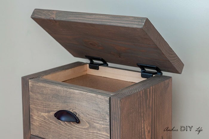 Hidden compartment by opening top in DIY nightstand
