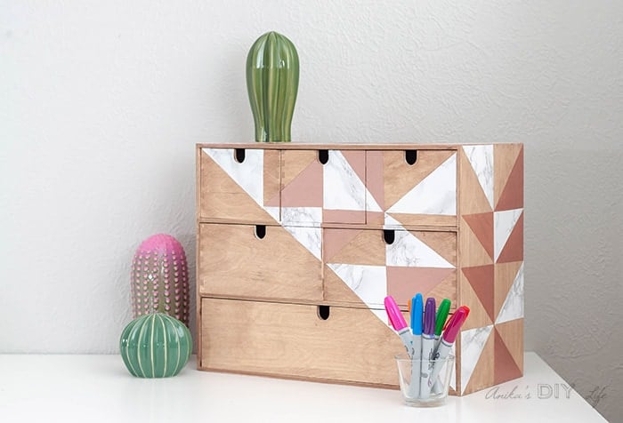 Ikea Moppe with marble and rose gold geometrical pattern.