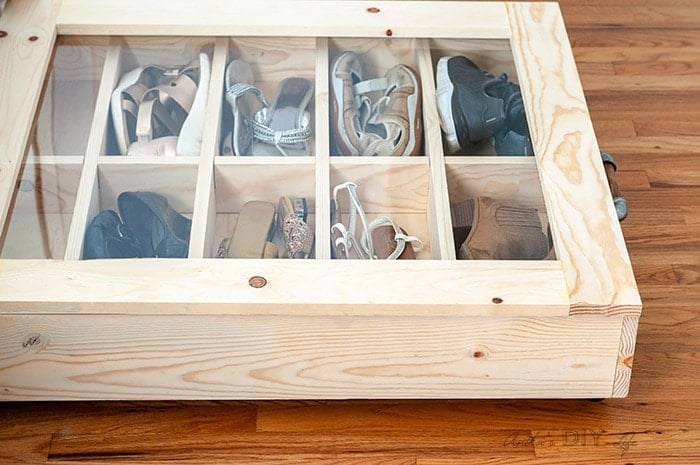 close of the plexiglass lid and dividers inside the DIY under bed shoe organizer
