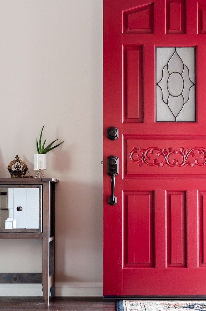 Red front door after DIY front door makeover without removing it