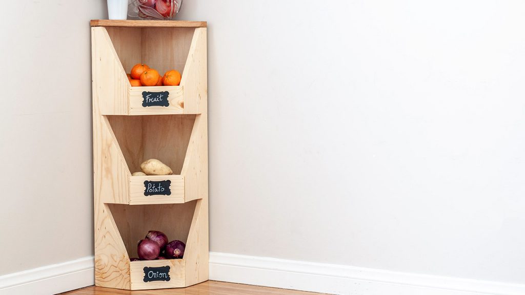 3 compartment DIY corner vegetable bin with vegetables in a kitchen corner