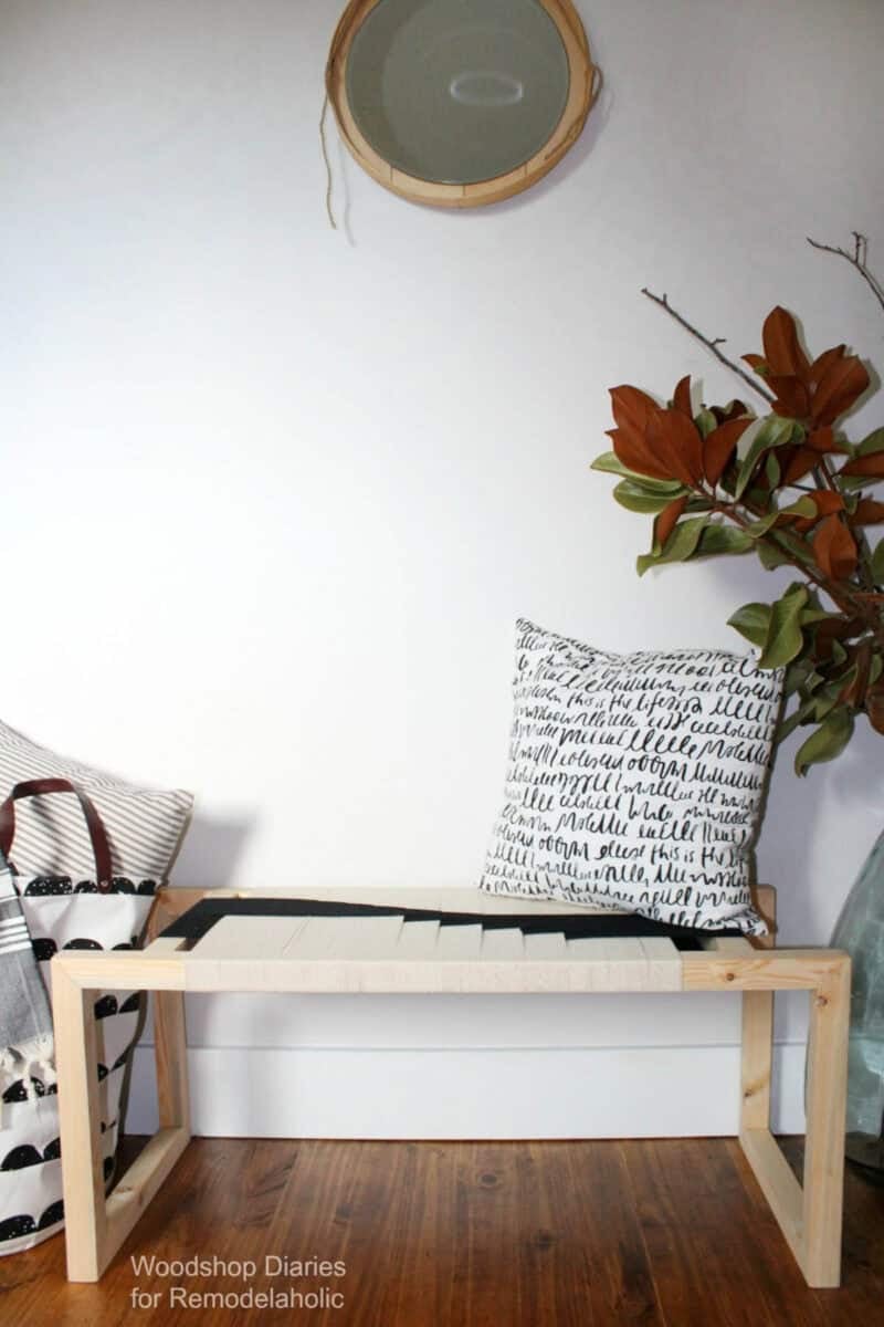 DIY bench with black and white woven seat