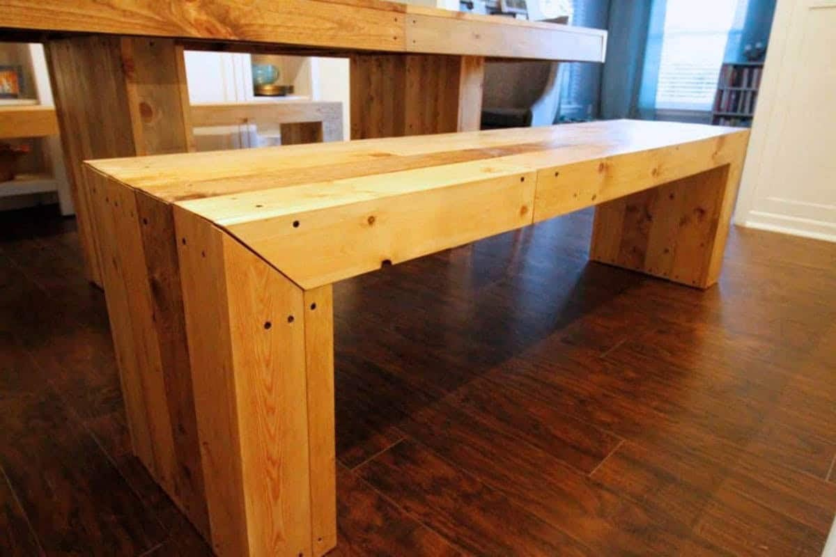 Wood bench next to dining room table