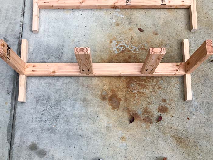 Short legs with 2x4 rails and supports attached.