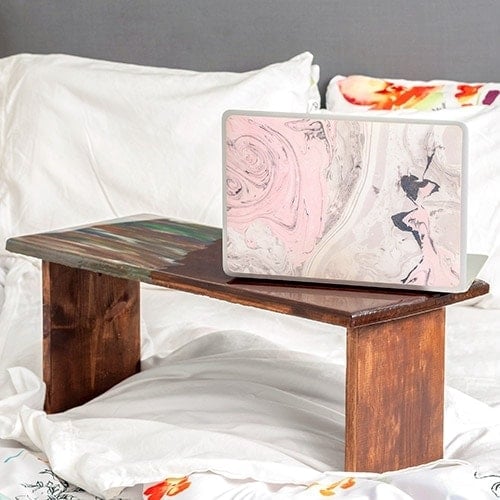 Learn how to make an easy DIY lap desk with our free plans. Plus learn how to create a gorgeous colorful jewel-toned epoxy resin look!