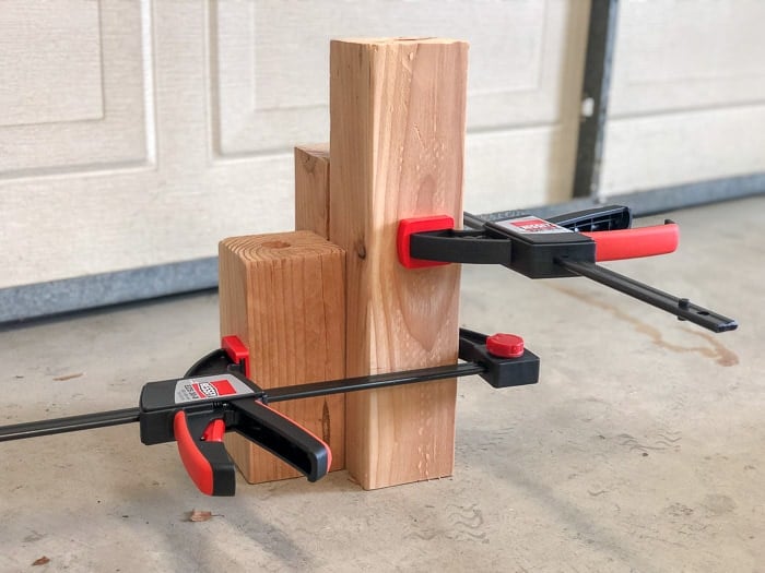 Glueing and clamping 4x4 to create a solar light post