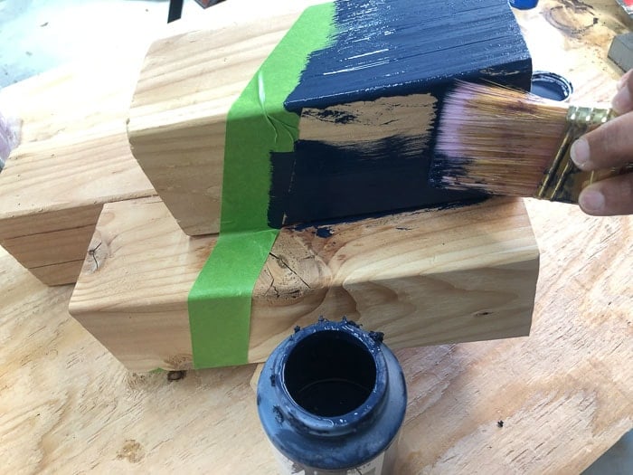 Painting the solar night light post.