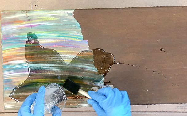 pouring glaze coat over unicorn spit