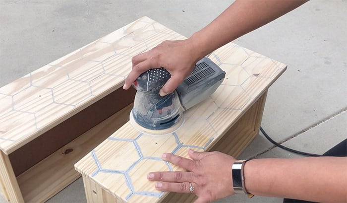 Sanding the engraved silver lines on the Ikea Rast drawer front