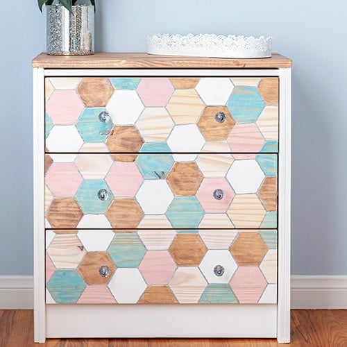 This amazing Ikea Rast nightstand hack is simple yet very gorgeous! Learn how to create this pretty Ikea Rast using a Dremel and few colorful stain colors!