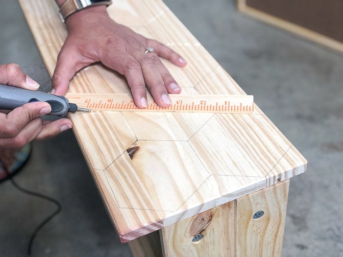 Engraving the hexagons using a dremel on the Ikea Rast drawers