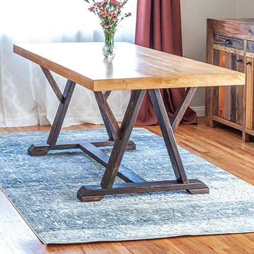 Learn how to build a DIY W-trestle dining table with full step by step tutorial and project video. Plus get the plans to build your own!