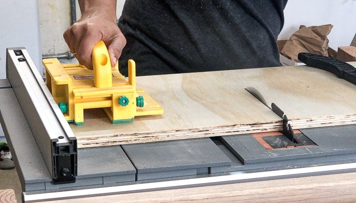 Cutting lumber for the DIY closet organizer with drawers
