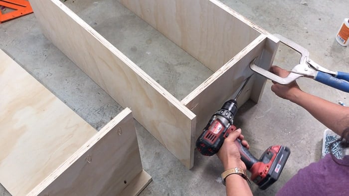 Attaching bottom supports to the sides