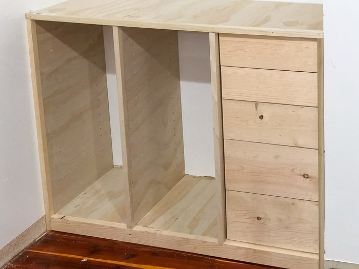 DIY closet organizer with trim installed