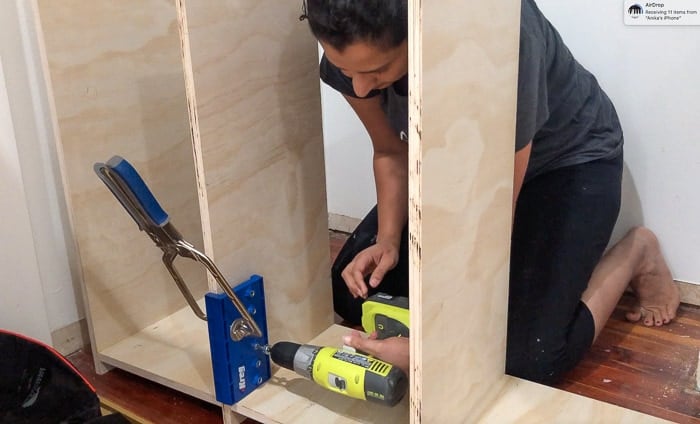 MAking shelf pin holes in the DIY craft organizer