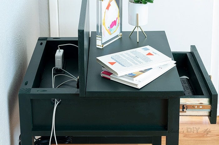 DIY end table with back open to reveal the power strips and a drawer to store remotes.