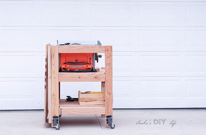 Easy Portable table saw stand with folding outfeed table