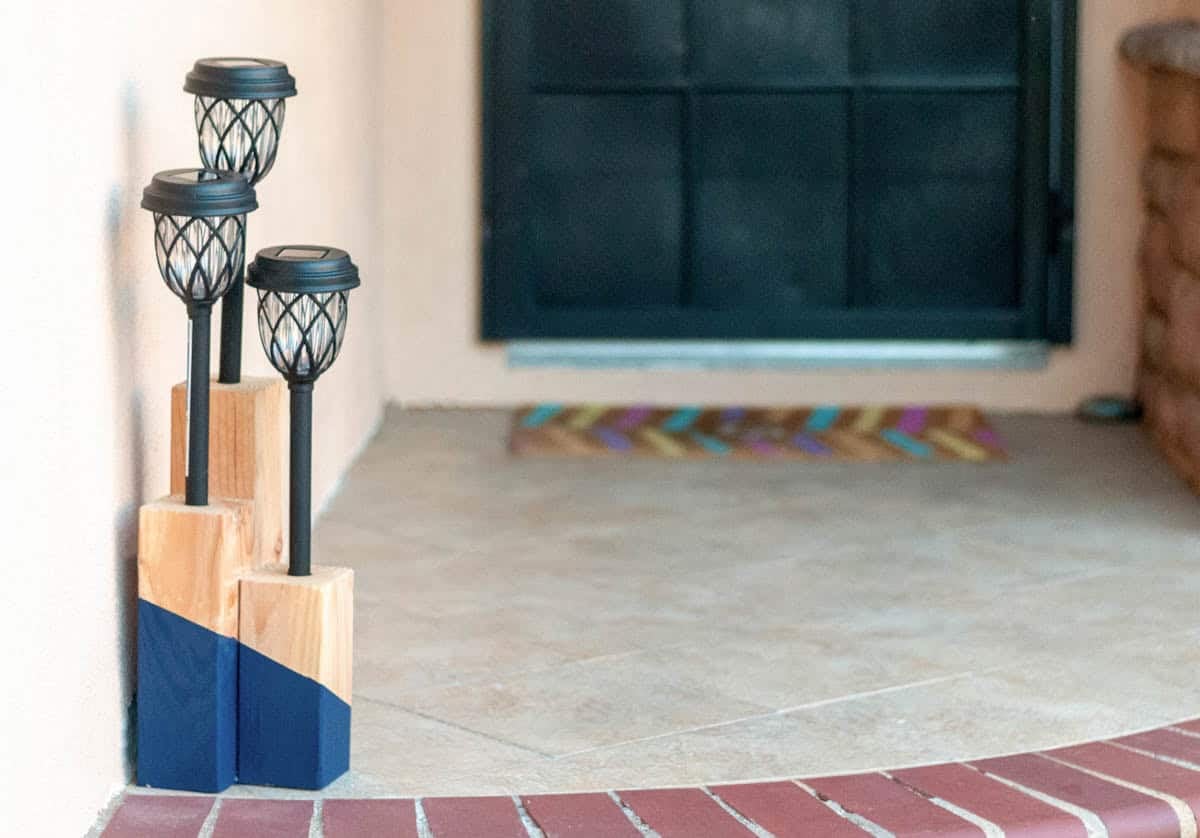 Solar light posts made from 4X4s with painted decorative accent