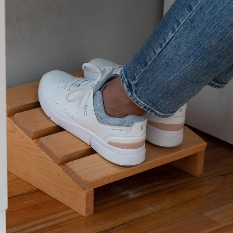 Learn how to build an easy wooden DIY foot rest for under your desk in under 30 minutes! This angled design is perfect for improving posture & ergonomics.