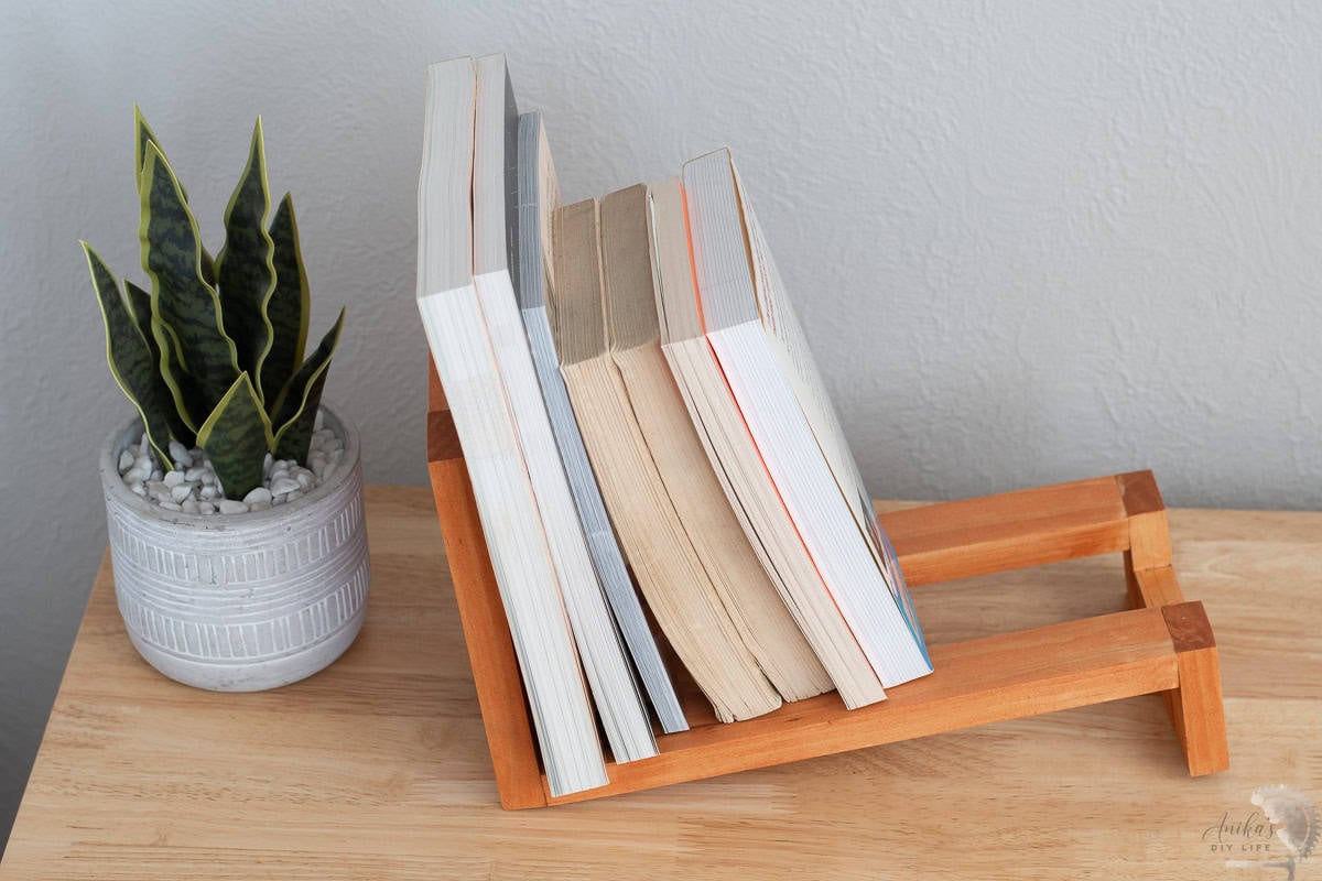 DIY table top book rack on the desk with books
