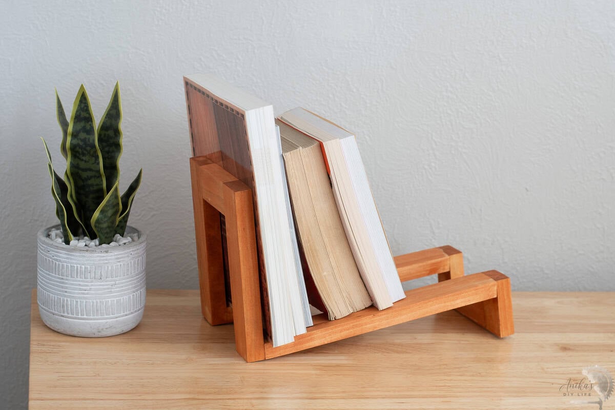 DIY modern bookrack for table top on table with books on it