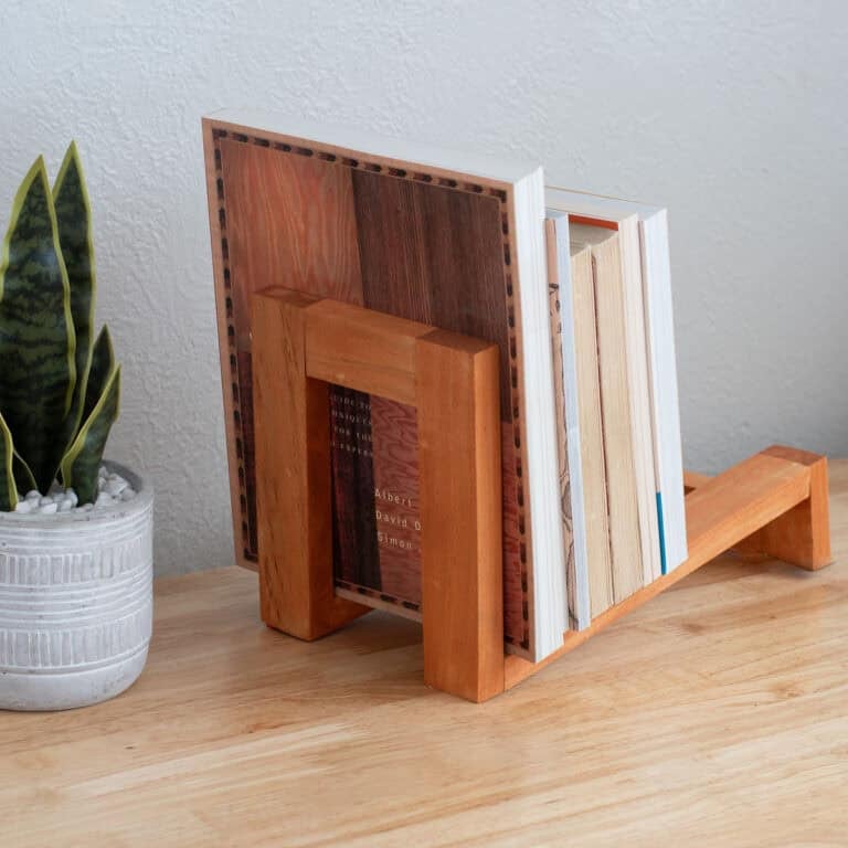 Make a modern DIY wooden stand with 1x2s and dowels. Beginner-friendly tutorial and the perfect handmade gift for readers, cooks, and teachers.
