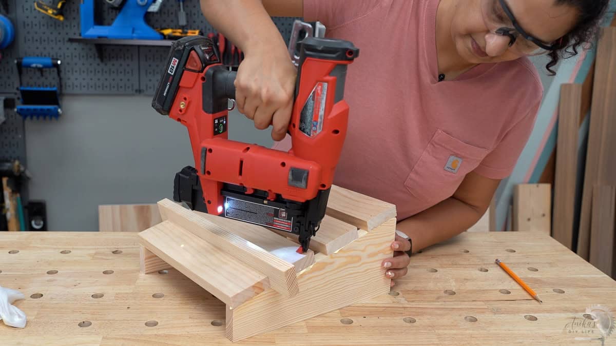 Attaching the slats for the DIY wooden foot rest