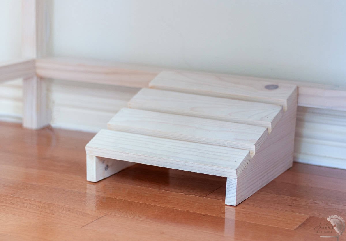 DIY White wooden foot rest under the table