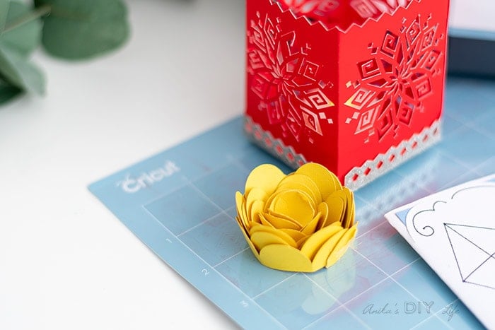 close up of paper flower and luminary made usig Cricut
