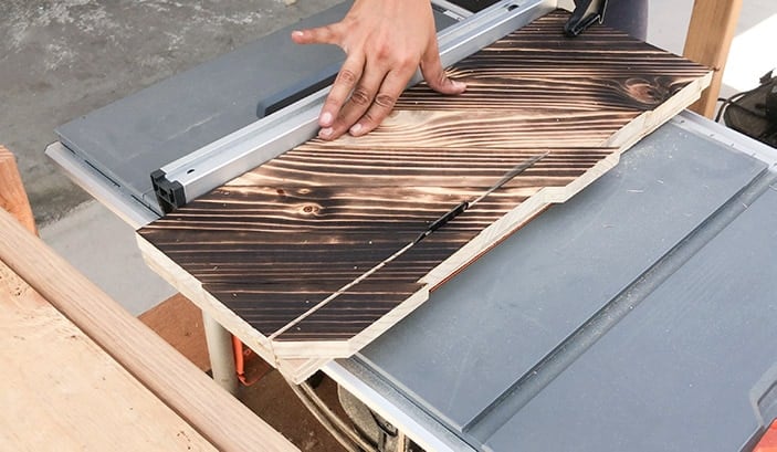 cutting off excess boards from the house number sign