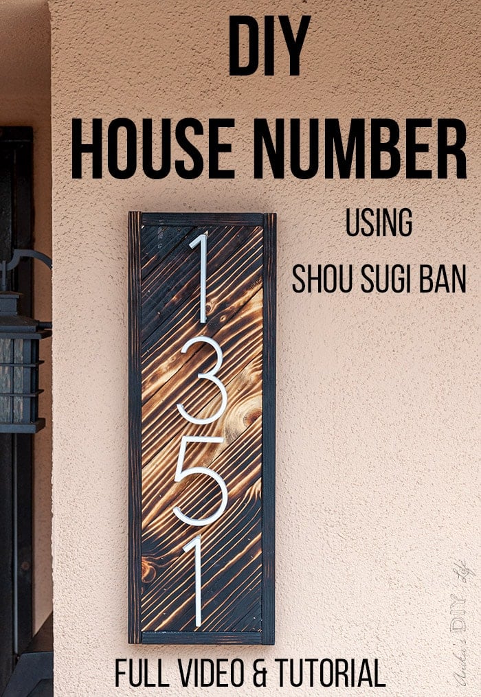 DIY House number sign on wall made using wood burning or shou sugi ban - with text overlay