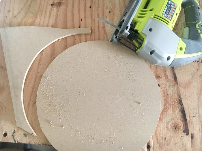 Cutting the clock face for the DIY wood clock.