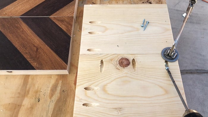 Attaching the wood panels to make the tray base
